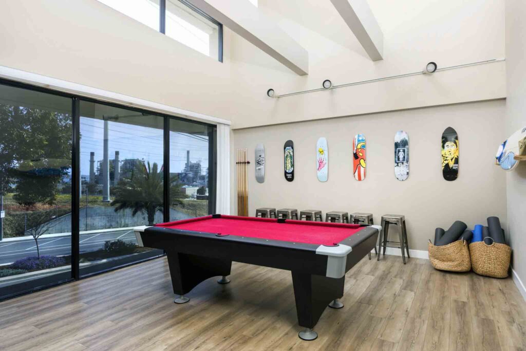 Photo of a game room with a pool table at a mental health PHP in Los Angeles
